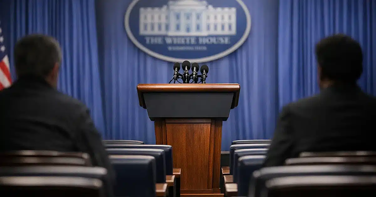 Empty White House press briefing room podium with multiple microphones in official setting