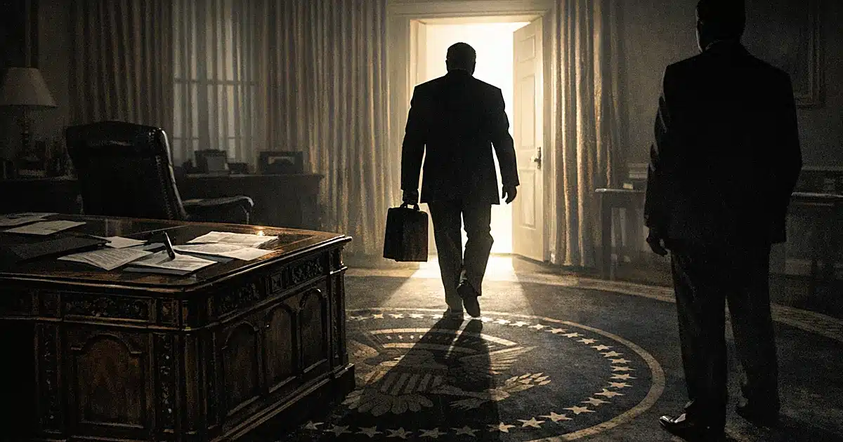 Silhouetted figure walking away from presidential desk toward exit as another figure waits in shadows