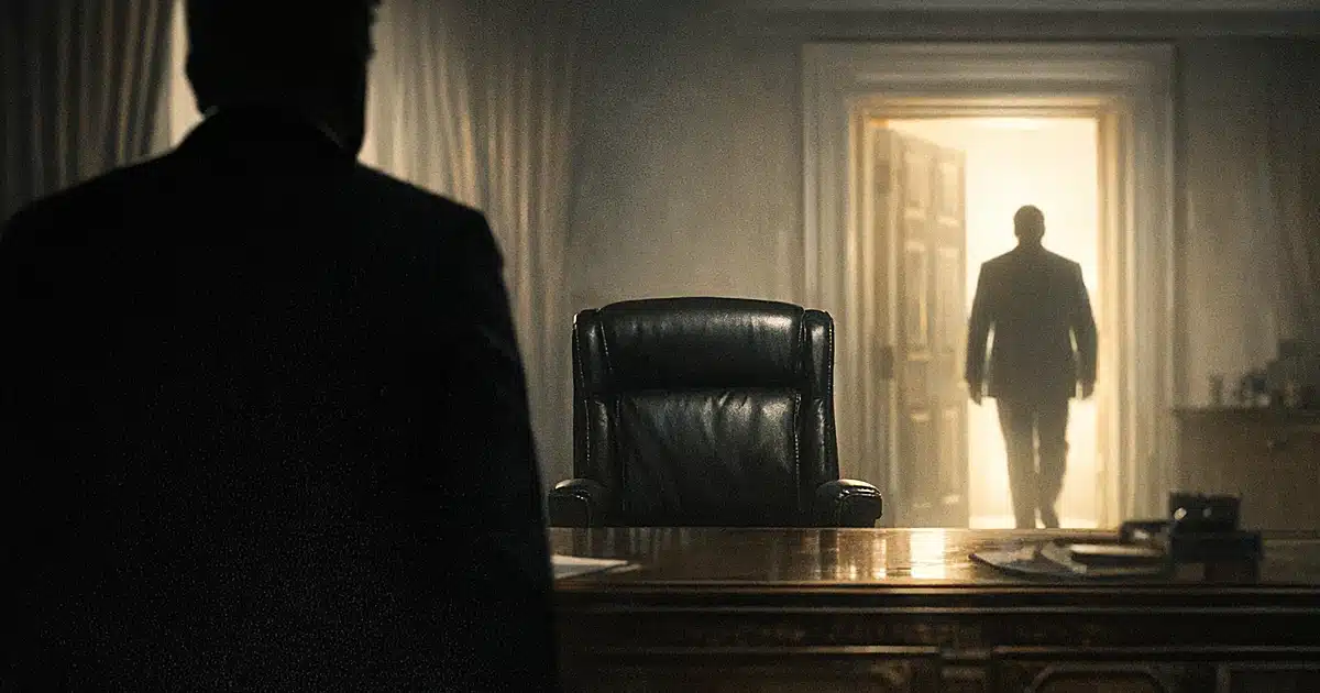 Silhouetted figures in office with empty chair between them, suggesting political succession and future leadership